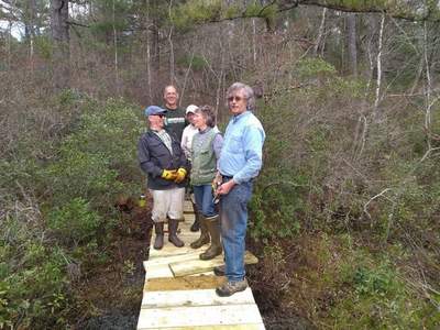 Group finishing boardwalk repairs